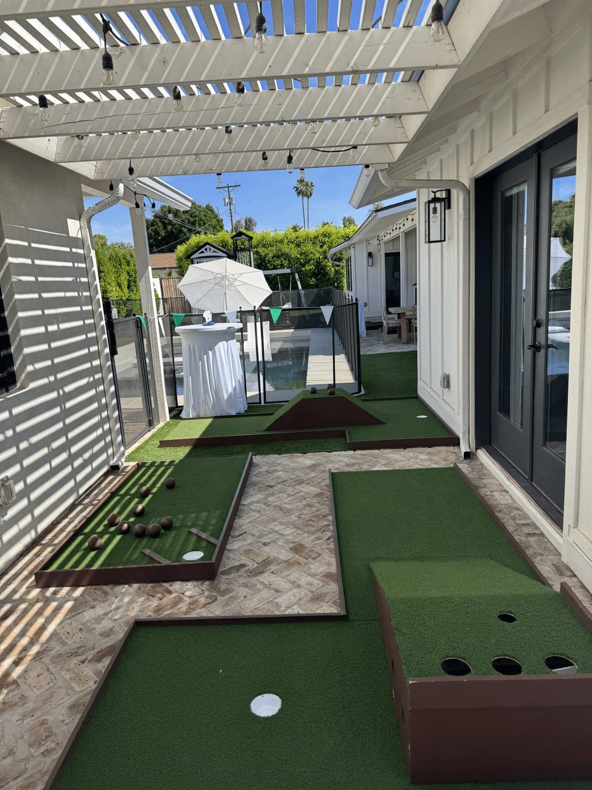 A Putts course set up in a backyard